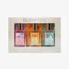 Glampton three piece shimmer fragrance mist gift set with Sweet Sugar Vanilla Sun Musk and Caribbean Coconut bottles 50ml size arranged in a holographic box