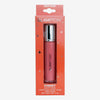 Glampton Dusty Rose Cheeky liquid blush packaging box with silver capped tube inside on a soft gray background