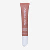 Glampton Pout Perfect latte lip treatment tube on a soft gray background