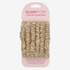 Glampton set of six satin scrunchies in solid cream displayed on branded card packaging against a light background.
