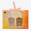 Glampton Sun Kissed Glow duo set featuring Golden Hour Illuminating Drops and Endless Summer Glow Bronzing Drops in a gradient gift box with ribbon handle.