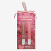 Glampton Sweet Kisses duo set featuring two Pout Perfect Hydrating Peptide Lip Treatment tubes in Latte and Watermelon shades, packaged in a pink gift box with kiss illustrations and a ribbon handle.